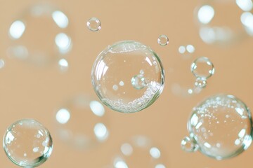 Poster - Transparent soap bubbles floating on a beige background: a macro photography shot