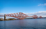 Landscape photography of railway Forth bridge, coastline with old historic village North Queensferry, Scotland, bay
