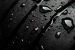 © Michael - Close-up of water droplets clinging to the textured surface of a car tire, emphasizing its wet grip capabilities