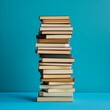 © vnmockupdesign - stack of books on a blue background, simple and eye-catching