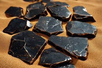 Poster - Shiny Black Rocks on Sandy Surface, Natural Mineral Collection for Background or Texture