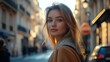 © Mas - Young woman smiling in a sunlit Paris street scene