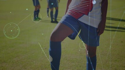 Poster - Soccer players on field with digital network animation overlaying scene
