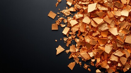 Poster - Pile of shimmering gold foil sheets creating a luxurious and opulent display in a well-lit environment