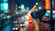 © miss irine - Close-up surveillance camera oversees busy city street at night filled with car traffic, vibrant lights, and blurred bokeh. Urban tech provides safety, security, monitoring public order.
