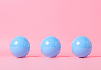 Poster - Three Blue Spheres on a Pink Background for Creative Projects