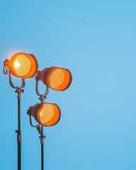 Fototapete - Minimalist Studio Lighting Essentials Vibrant Orange Professional Spotlights - Creative Content Production and Visual Media Innovation
