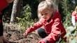 ©  S u n n y B u n n y - A Young Girl Planting a Tree in Nature: Conservation Efforts in Action, Engaging Children in Environmental Stewardship and Sustainability Activities.