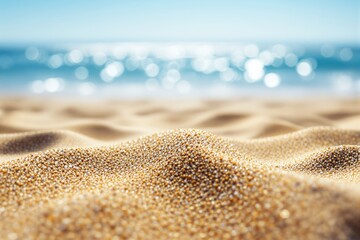Aufkleber - Close-up of sand on a beach with ocean in background.