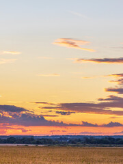 Wall Mural - the sky is a beautiful orange color as the sun sets