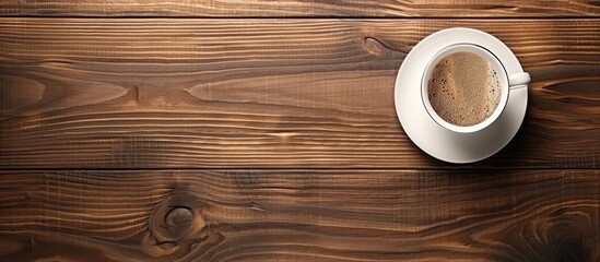 Aufkleber - Aerial view of a white coffee cup filled with rich coffee atop a rustic wooden table with ample empty space for text on the left side