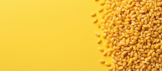 Poster - Golden yellow backgound with a top view of honey air rice and puffed wheat cereal spread on the left side creating ample copy space on the right