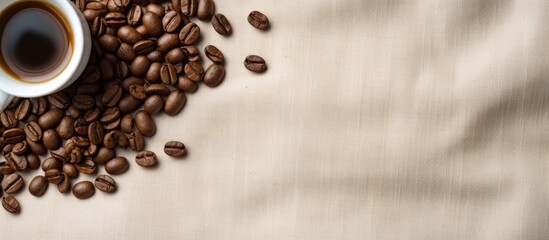 Poster - Coffee cup positioned at the top left surrounded by scattered coffee beans on a light beige linen cloth background with ample copy space on the right
