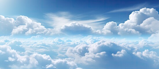 Poster - Vast blue sky with fluffy white clouds occupying the center and top portions, creating ample space for text or branding in a serene atmosphere.