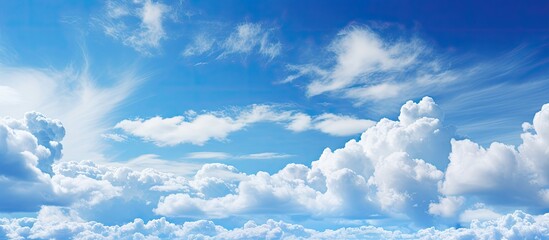 Aufkleber - Abstract landscape with fluffy white clouds against a bright blue sky showcasing unique shapes and ample copy space for creative usage