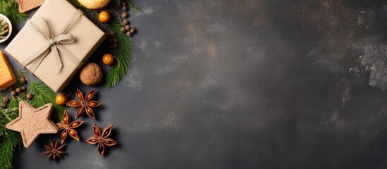 Poster - Holiday gift arrangement with wrapped presents, pine branches, and rustic decorations on a dark slate background with warm earthy tones.
