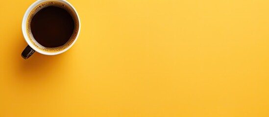 Poster - Aromatic coffee cup on vibrant yellow background with ample negative space for text, positioned top left for dynamic composition.