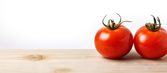 Poster - Fresh red tomatoes on wooden surface with white background, placed side by side, highlighting their vibrant color and natural texture.