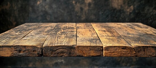 Poster - Rustic wooden tabletop with rich brown tones centered against a softly blurred background showcasing a warm bokeh effect highlighting the texture