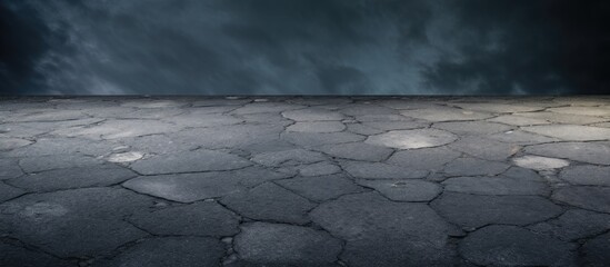 Poster - Asphalt road texture with cracked surface in dark tones featuring ample negative space for text, positioned in the lower third of the image