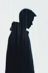Poster - A man is standing in front of a white background with a black coat