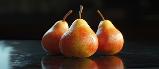 Poster - Fresh ripe pears with a glossy texture in shades of yellow and orange, positioned closely together with the front pear prominently featured.