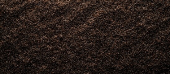 Aufkleber - Dark brown felt texture with subtle highlights in a high-resolution background, showcasing deep earthy tones and a soft, plush appearance.