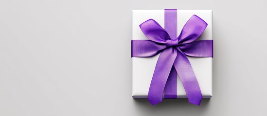 Poster - Elegant white gift box adorned with a vibrant purple bow, centered on a soft gray background, offering ample copy space for text or branding.