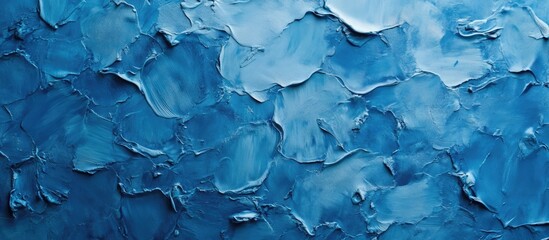 Fototapete - Blue textured wall background featuring various shades of blue with thick plaster-like strokes and ample copy space for creative design use.