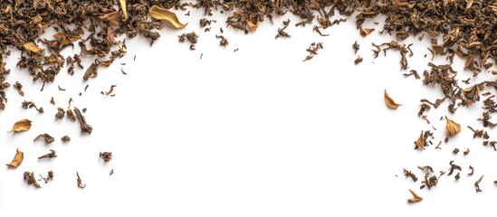 Poster - Dried tea leaves arranged in a neat corner frame on a clean white background with scattered leaves offering ample space for text placement
