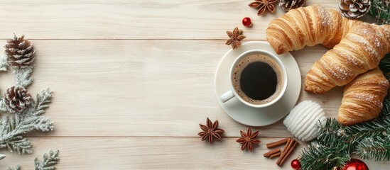 Poster - Warm Christmas flat lay with a steaming coffee cup, golden croissants, pine cones, and festive gloves on a light wooden background.