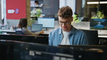 Poster - Smiling programmer typing keyboard working computer at office workplace closeup
