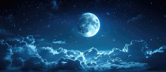 Wall Mural - Serene night sky with a bright full moon centered among soft, glowing clouds, deep blue background with scattered stars creating a tranquil atmosphere.