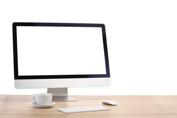 Aufkleber - Computer monitor, keyboard, mouse and cup of drink on wooden desk against white background