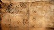 © J - An aged, ink-stained piece of paper with dark spots