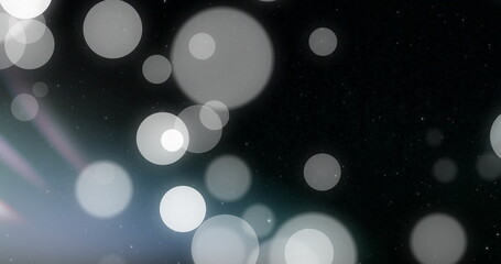 Poster - Image of glowing light spots over black background