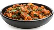 © KHF - Chicken tikka masala with spinach in a black bowl isolated on a white background.