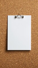 Poster - A blank sheet of paper is clipped onto a corkboard, inviting thoughts and ideas in a clutter-free workspace. This setup encourages inspiration and creative expression