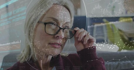 Poster - Adjusting glasses, woman interacting with animation on transparent screen in school