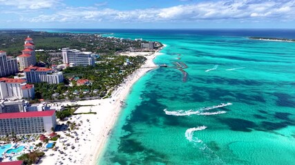 Wall Mural - aerial view of the public beach at goodmans bay, nassau, bahamas, with water sports and turquoise oc