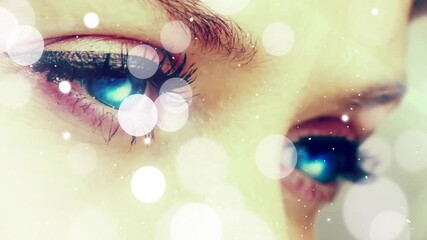Poster - Animation of eyes with blue reflections and abstract light bokeh effects