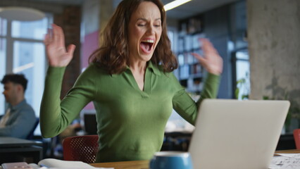 Poster - Amazed lady looking monitor in office closeup. Businesswoman rejoicing success