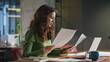 © stockbusters - Pensive woman looking papers working office closeup. Manager analysing documents