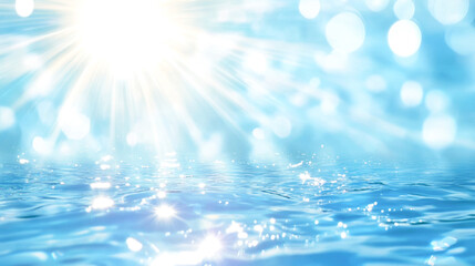 sunlight sparkling on calm ocean waves with bokeh effect in blue atmosphere