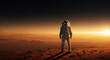 © Dmitry - Spacesuit clad astronaut stands on a mars like planet looking at a sunrise. Concept of space exploration and future missions on the planet for scientific research