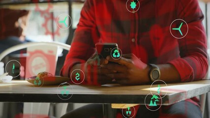 Poster - Using smartphone, person in cafe with animation of eco-friendly icons overlay
