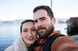 © asier - Young tourists capturing selfie amid traditional horreos, exploring picturesque coastal scenery in combarro, galicia, savoring romantic vacation moments by seaside