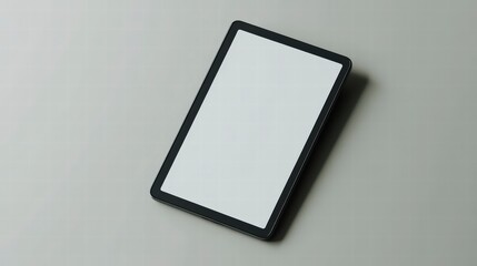 Poster - Tablet on Table: A high-angle shot of a sleek tablet resting on a smooth surface, with a bright screen, perfect for digital content display.