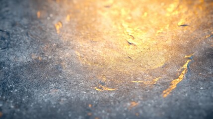 Poster - Golden light reflects on a textured surface, creating an abstract pattern with warm hues and intriguing details, suitable for backgrounds and design elements