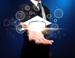 © BillionPhotos.com - E-learning technology, businessman hold graduation hat